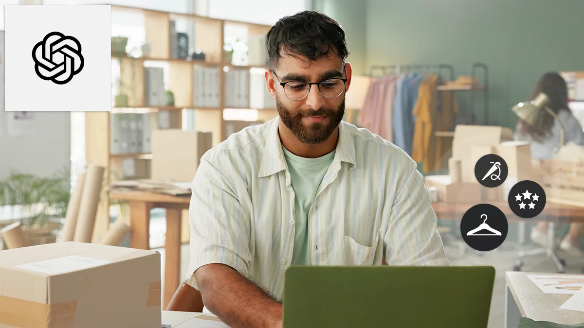 Man on laptop in workplace, ChatGPT logo